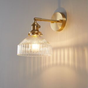 ribbed glass wall light sconce in gold finish for bedroom